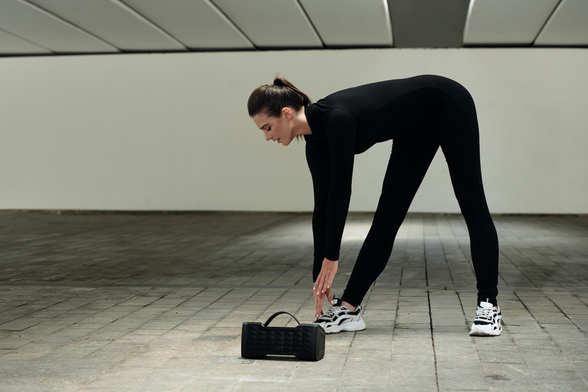 Young girl working out to music